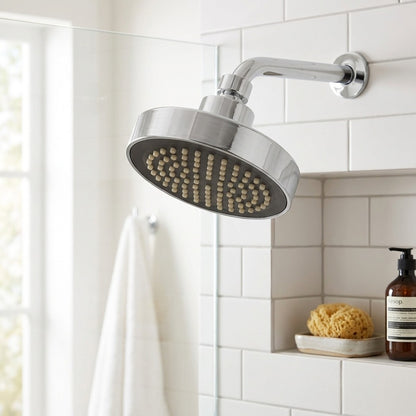 Lagomel fixed shower head in chrome, set in a Contemporary/Modern bathroom