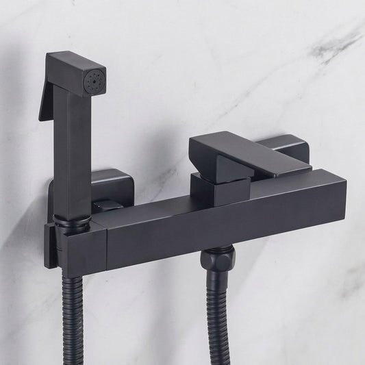 Lagomel wall-mounted single-handle bidet faucet in matte black, set in a Contemporary bathroom
