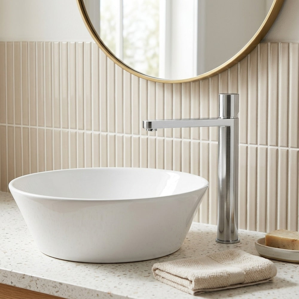 Lagomel single-hole waterfall vessel sink faucet, set in a Modern/Contemporary bathroom
