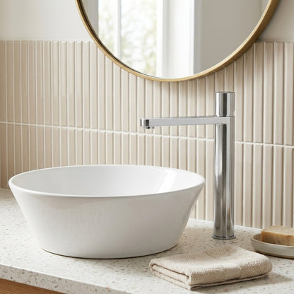 Lagomel single-hole waterfall vessel sink faucet, set in a Modern/Contemporary bathroom