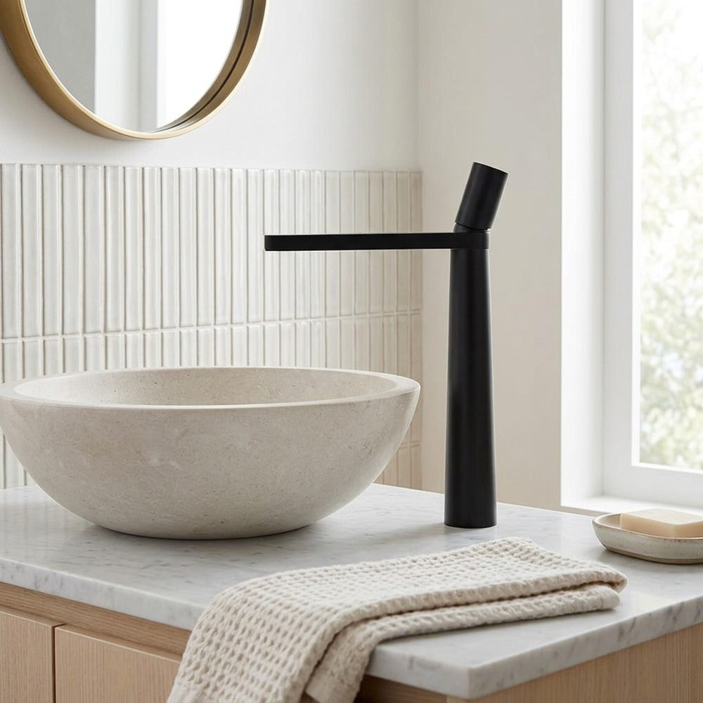 Lagomel single-hole waterfall vessel sink faucet, set in a Modern/Contemporary bathroom