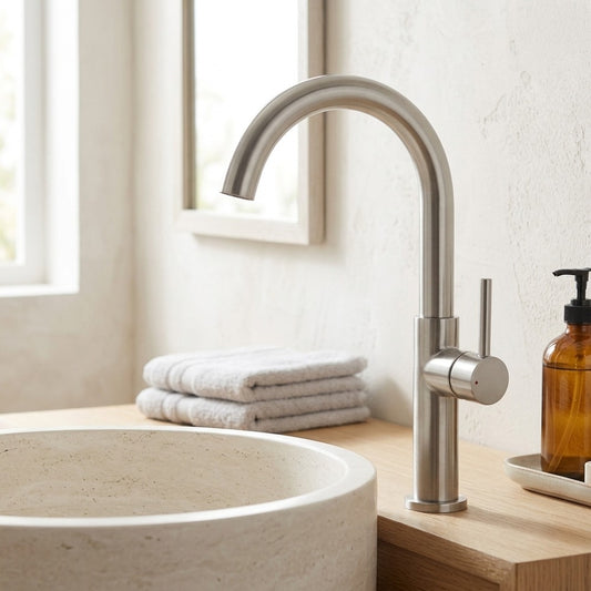 Lagomel single-handle vessel sink faucet in stainless steel, matte black, set in a Modern bathroom