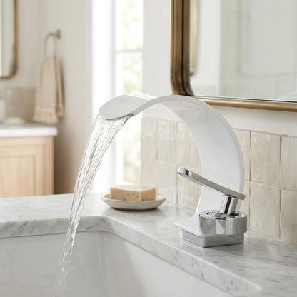 Lagomel waterfall single-hole bathroom faucet in chrome, two-tone / mixed finish, set in a Modern/Contemporary/Minimalist bathroom