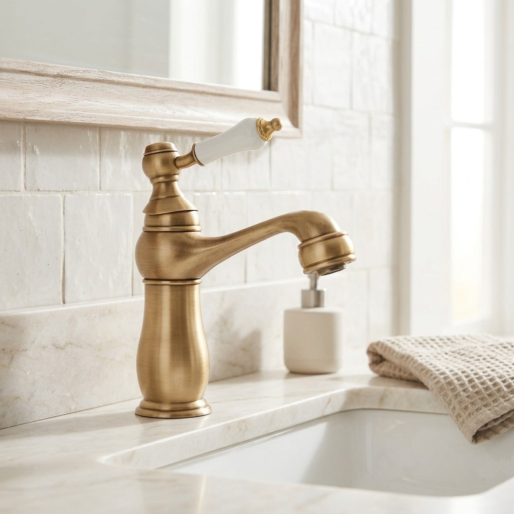 Lagomel single-hole bathroom faucet in antique brass, chrome, polished gold, two-tone / mixed finish, set in a Traditional/Classic bathroom