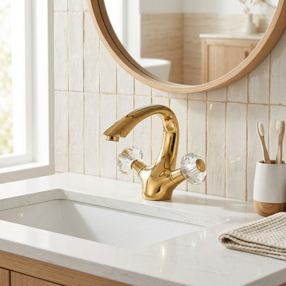 Lagomel single-hole bathroom faucet in polished gold, set in a Traditional/Classic/Vintage/Retro bathroom