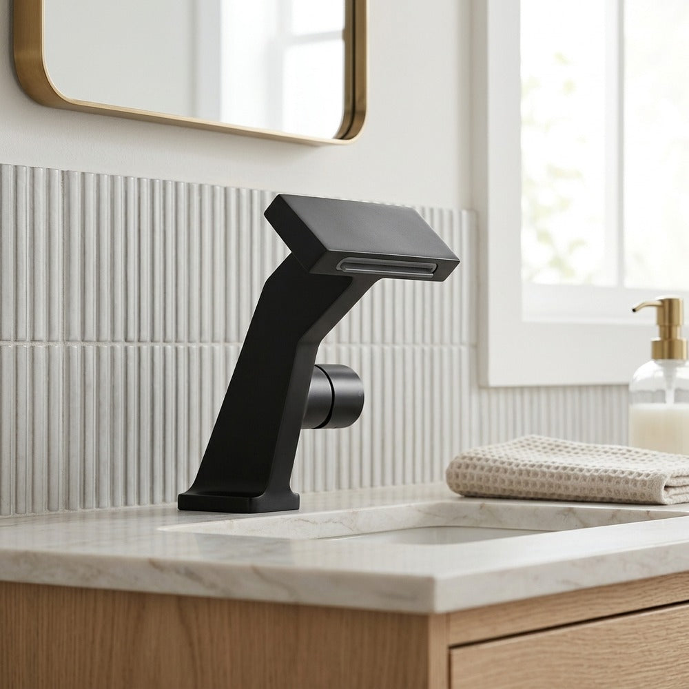 Lagomel waterfall single-hole bathroom faucet, set in a Modern/Minimalist bathroom