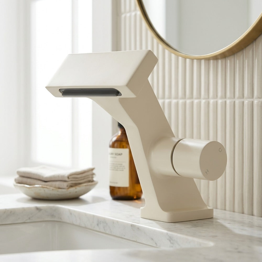 Lagomel waterfall single-hole bathroom faucet, set in a Modern/Minimalist bathroom