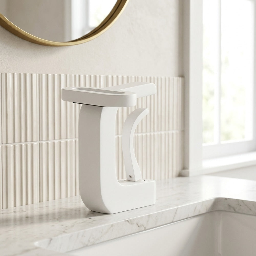 Lagomel waterfall single-hole bathroom faucet, set in a Modern/Minimalist bathroom