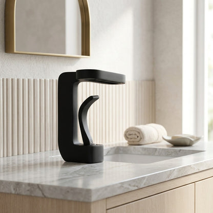 Lagomel waterfall single-hole bathroom faucet, set in a Modern/Minimalist bathroom