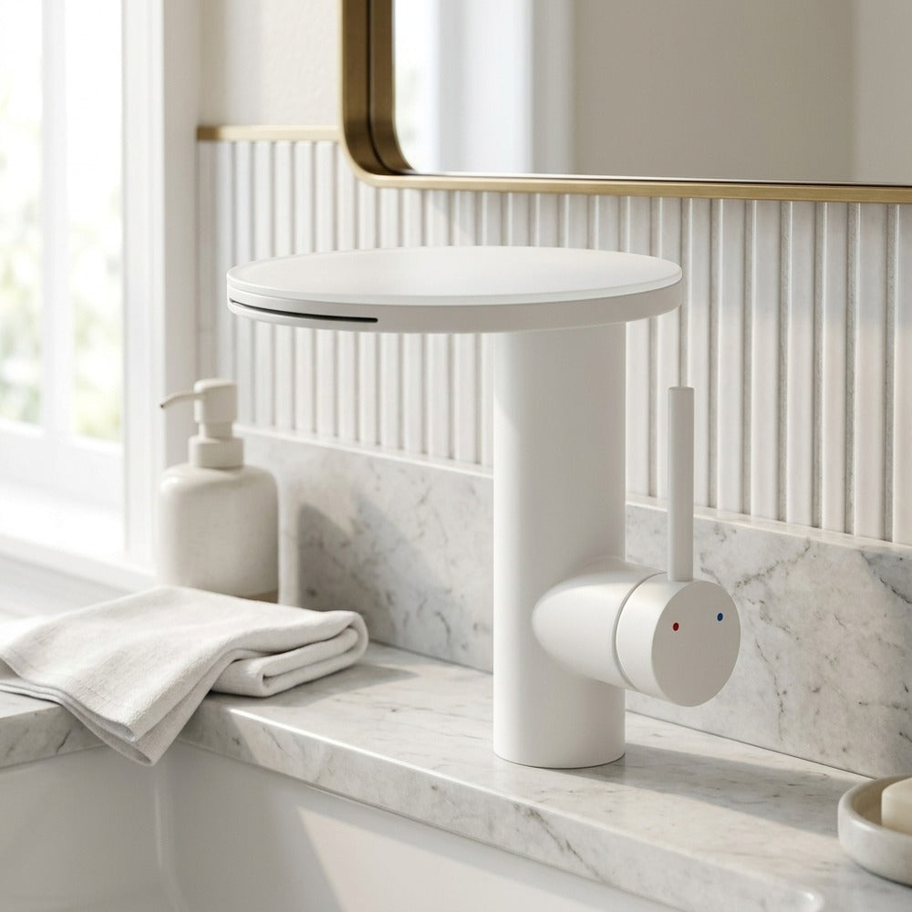 Lagomel waterfall single-hole bathroom faucet in chrome, brushed gold, matte white, gunmetal, painted / powder coated, set in a Modern/Contemporary bathroom