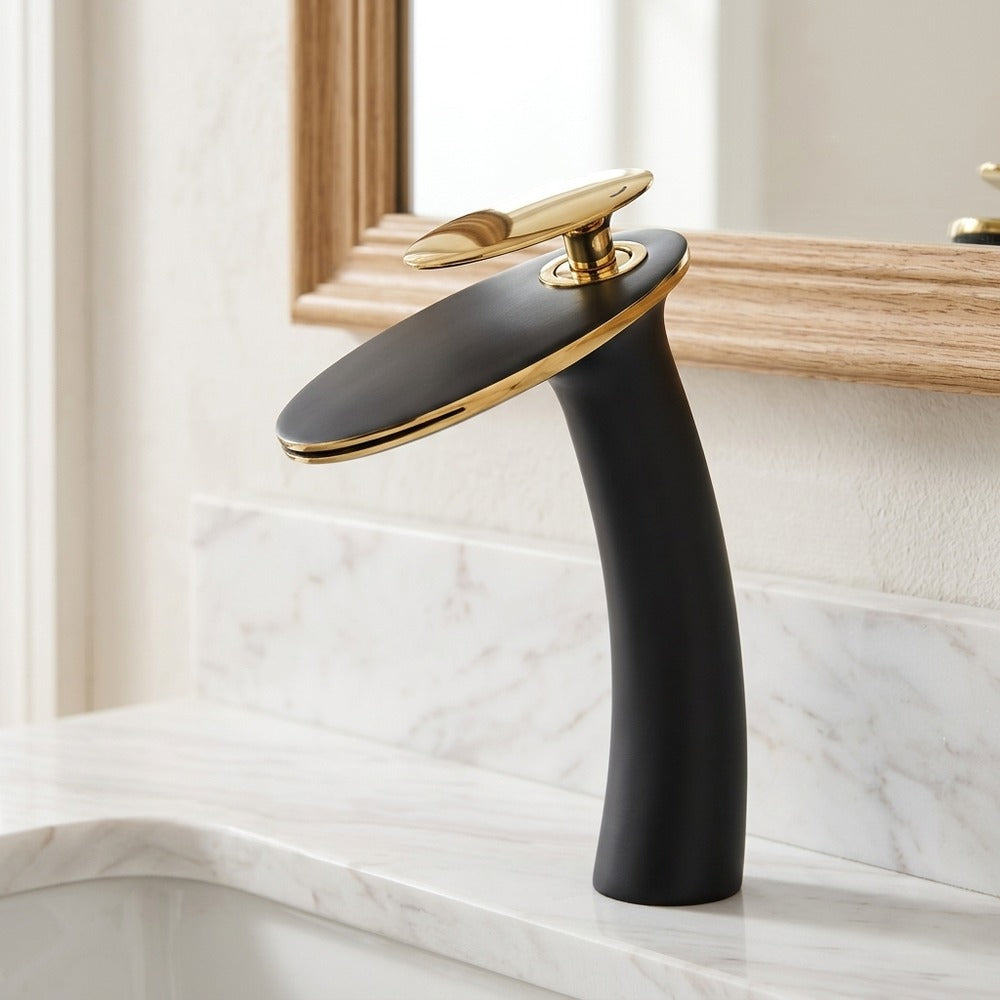 Lagomel single-hole waterfall vessel sink faucet in two-tone / mixed finish, set in a Contemporary bathroom