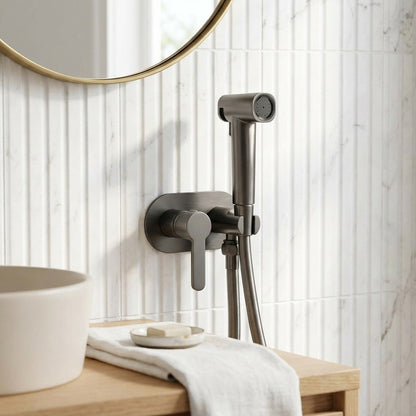 Lagomel wall-mounted single-handle bidet faucet in gunmetal, matte white, matte black, chrome, brushed gold, set in a Contemporary bathroom