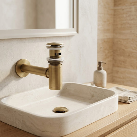 Lagomel wall-mounted p-trap in antique brass, brushed brass, chrome, matte black, polished gold, set in a Contemporary bathroom