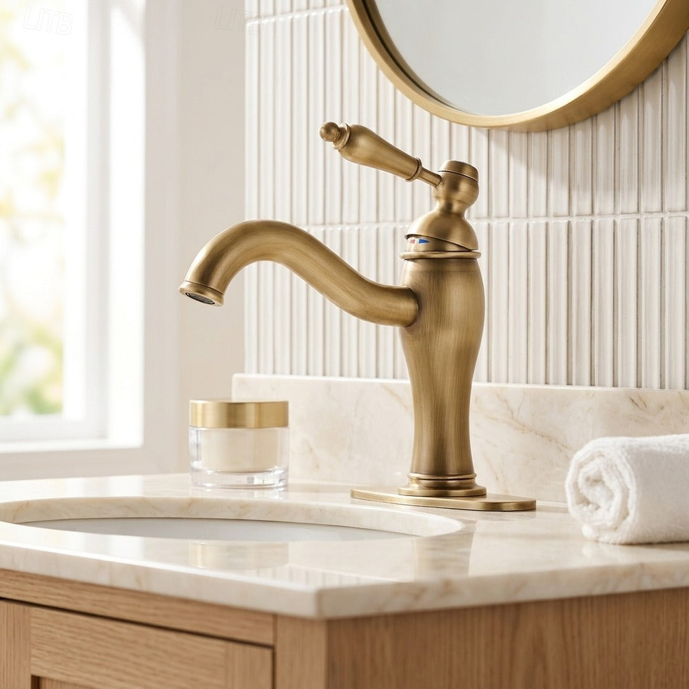 Lagomel single-hole bathroom faucet in antique brass, set in a Traditional/Classic/Vintage/Retro bathroom