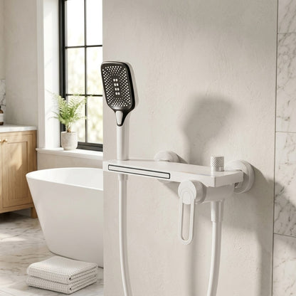 Lagomel waterfall single-handle wall-mount tub filler, set in a Modern/Minimalist bathroom