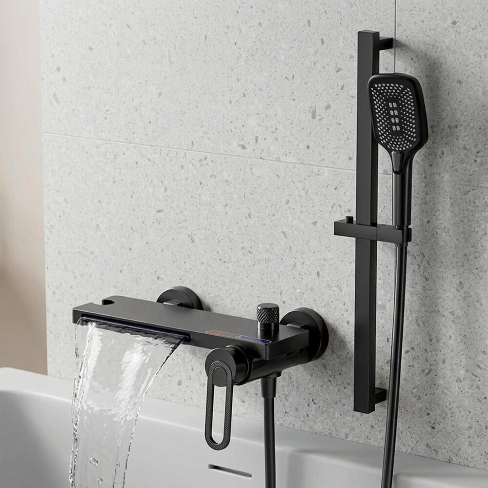 Lagomel waterfall single-handle wall-mount tub filler, set in a Modern/Minimalist bathroom