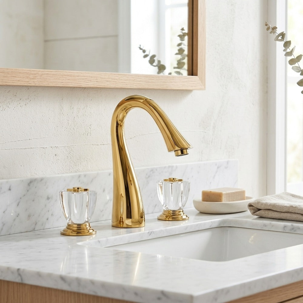 Lagomel widespread bathroom faucet in polished gold, set in a Modern/Contemporary bathroom