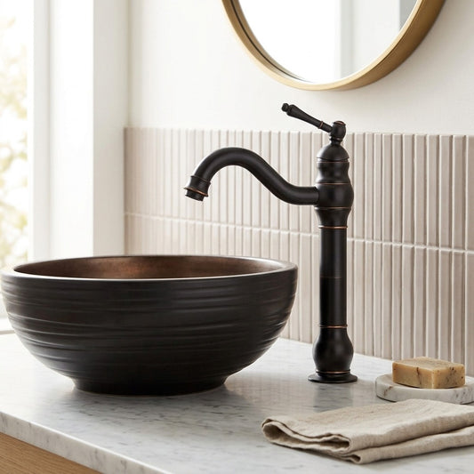 Lagomel single-handle vessel sink faucet in antique brass, oil-rubbed bronze, chrome, polished gold, brushed nickel, set in a Traditional/Classic/Vintage/Retro bathroom
