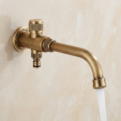Lagomel wall-mounted washing machine faucet in matte black, antique brass, set in a Traditional/Classic/Rustic/Industrial bathroom