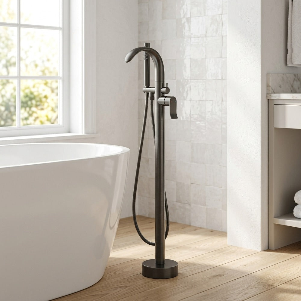 Lagomel freestanding tub filler in gunmetal, set in a Modern/Minimalist bathroom