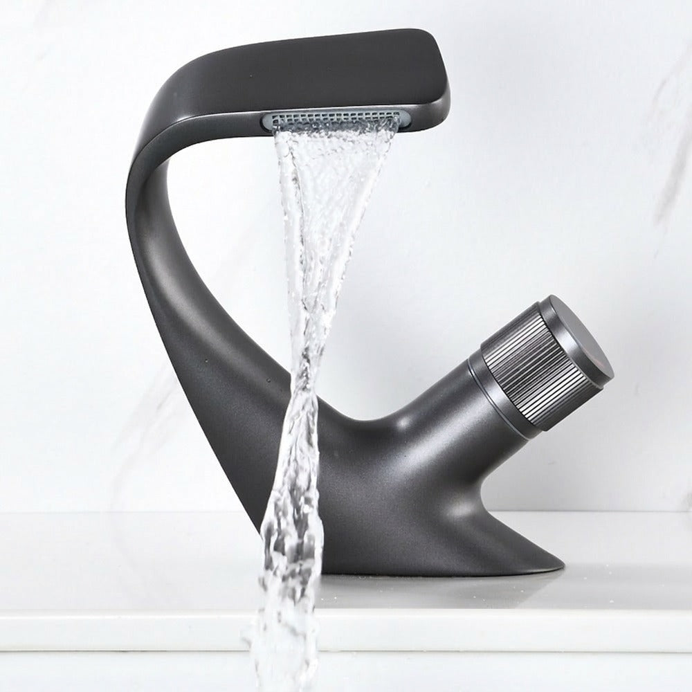 Lagomel waterfall single-hole bathroom faucet, set in a Modern/Minimalist bathroom