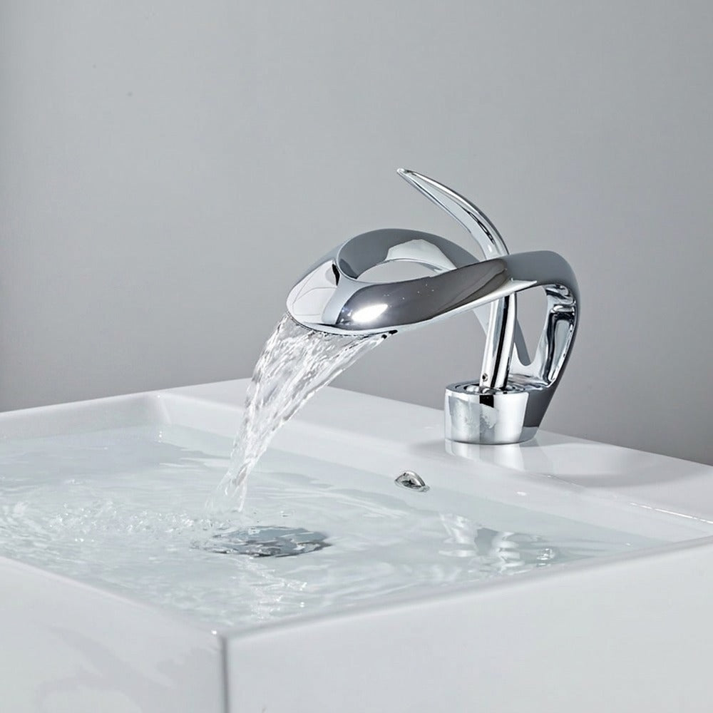 Lagomel waterfall single-hole bathroom faucet, set in a Modern/Minimalist bathroom