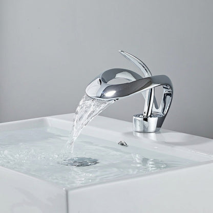 Lagomel waterfall single-hole bathroom faucet, set in a Modern/Minimalist bathroom