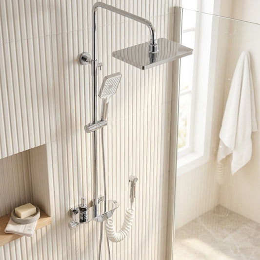Lagomel wall-mounted tub and shower system in chrome, gunmetal, set in a Contemporary bathroom