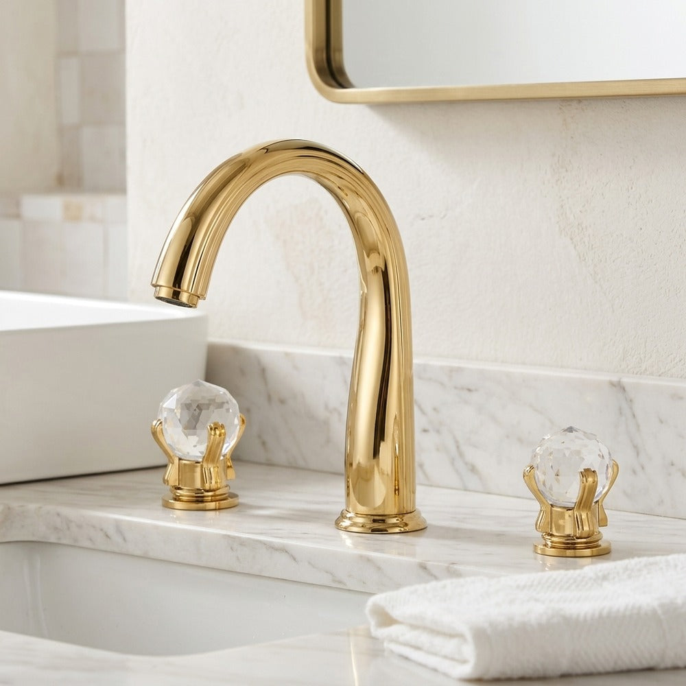 Lagomel widespread bathroom faucet in polished gold, set in a Modern/Contemporary bathroom