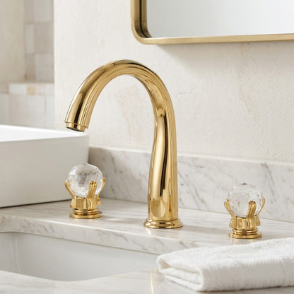 Lagomel widespread bathroom faucet in polished gold, set in a Modern/Contemporary bathroom