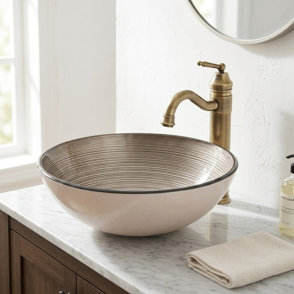 Lagomel single-hole faucet and sink set in antique brass, two-tone / mixed finish, set in a Contemporary/Traditional/Classic bathroom