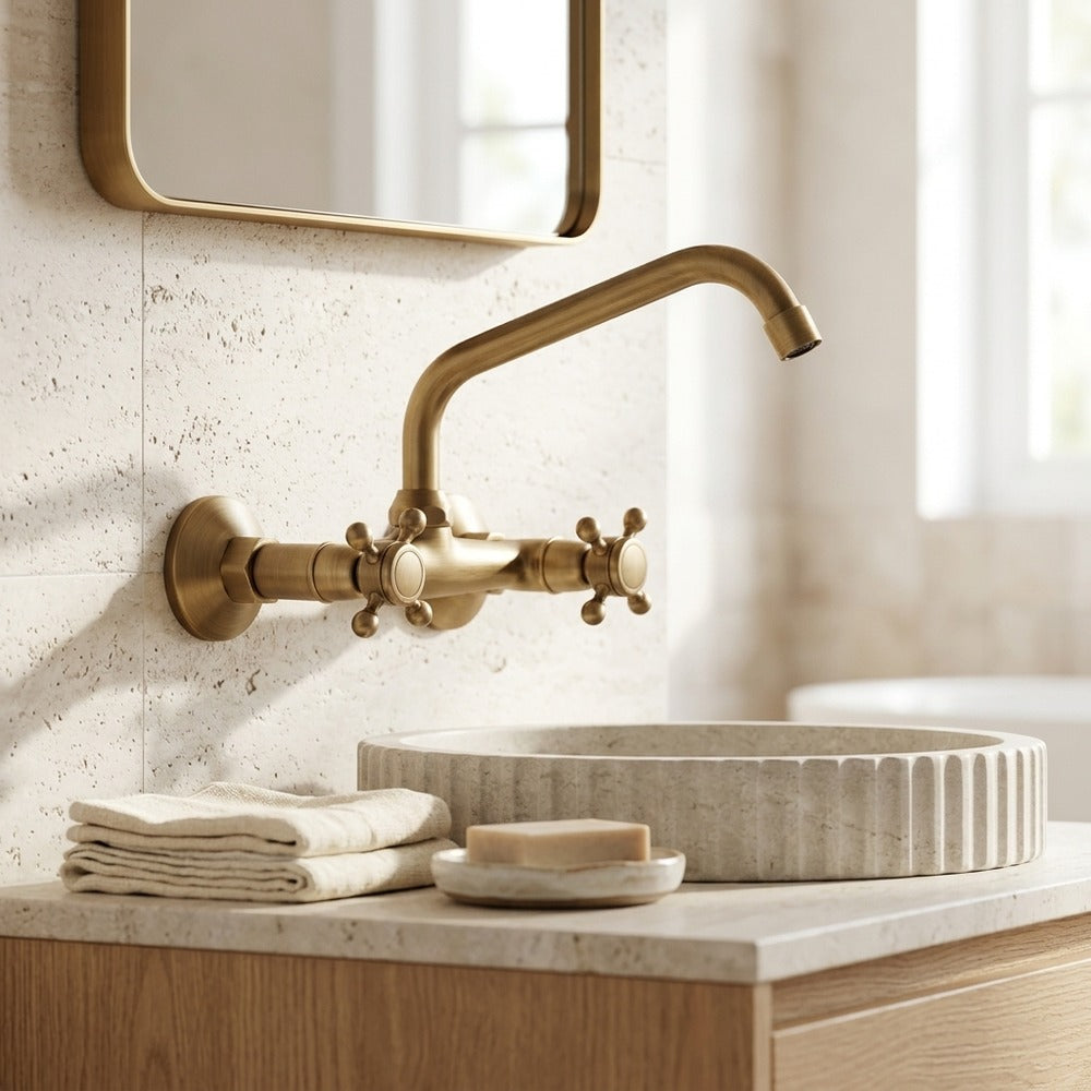 Lagomel wall-mount bathroom faucet in antique brass, set in a Traditional/Classic/Vintage/Retro bathroom