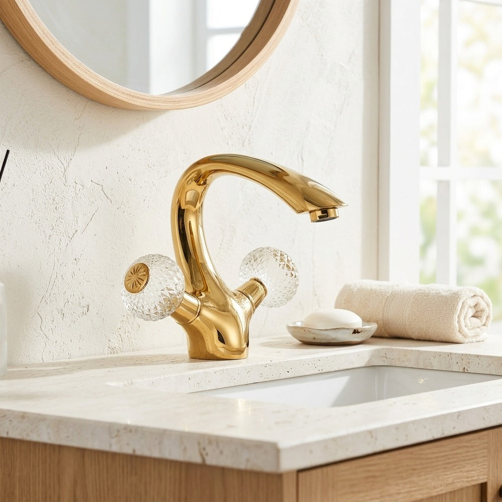 Lagomel single-hole bathroom faucet in polished gold, set in a Traditional/Classic/Vintage/Retro bathroom