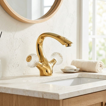 Lagomel single-hole bathroom faucet in polished gold, set in a Traditional/Classic/Vintage/Retro bathroom