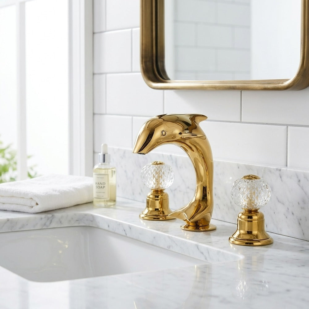 Lagomel widespread bathroom faucet in polished gold, set in a Modern/Contemporary bathroom