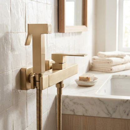 Lagomel wall-mounted single-handle bidet faucet in brushed gold, chrome, gunmetal, matte black, rose gold, set in a Contemporary bathroom