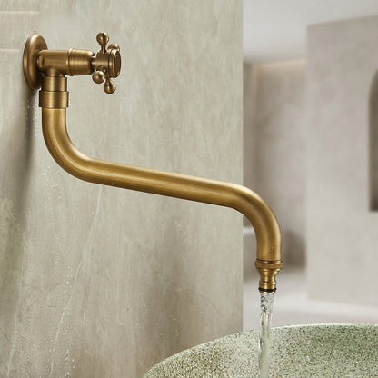 Lagomel wall-mounted single-handle outdoor faucet in antique brass, set in a Vintage/Retro/Traditional/Classic bathroom