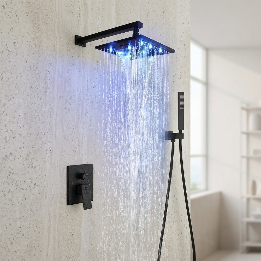 Lagomel wall-mounted single-handle complete shower system in matte black, chrome, set in a Contemporary bathroom