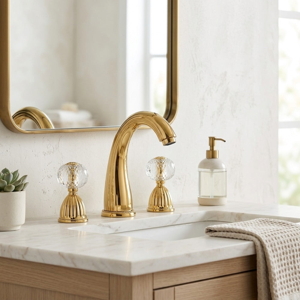 Lagomel widespread bathroom faucet in polished gold, set in a Modern/Contemporary bathroom