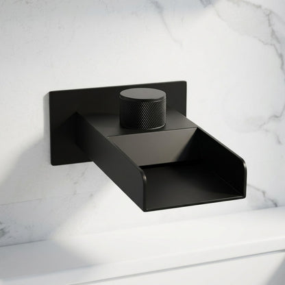 Lagomel waterfall wall-mount bathroom faucet in matte black, set in a Modern/Contemporary bathroom