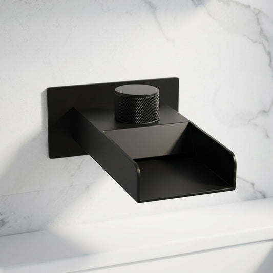 Lagomel waterfall wall-mount bathroom faucet in matte black, set in a Modern/Contemporary bathroom