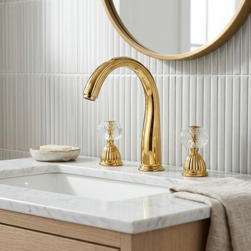 Lagomel widespread bathroom faucet in polished gold, set in a Modern/Contemporary bathroom