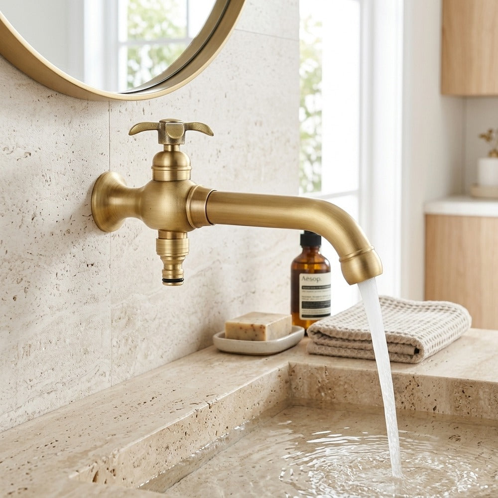 Lagomel single-handle wall-mount bathroom faucet in antique brass, two-tone / mixed finish, chrome, set in a Vintage/Retro bathroom