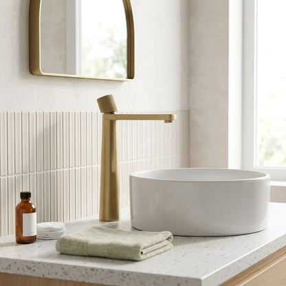 Lagomel single-hole waterfall vessel sink faucet in brushed gold, set in a Traditional/Classic/Vintage/Retro bathroom