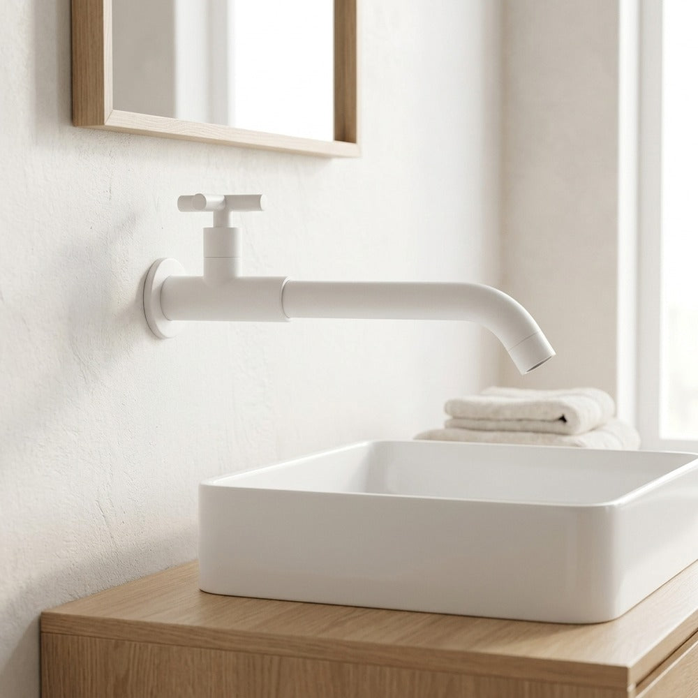 Lagomel wall-mount bathroom faucet in matte black, chrome, matte white, antique brass, polished gold, set in a Modern/Minimalist bathroom