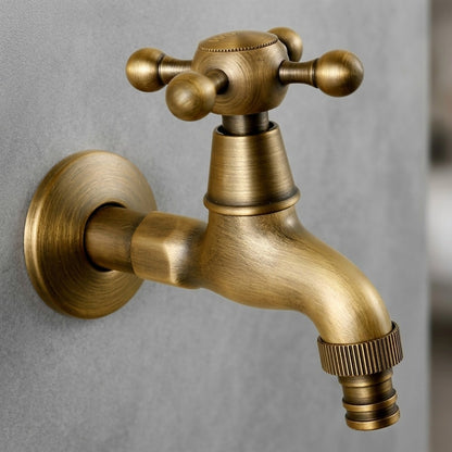 Lagomel wall-mounted single-handle washing machine faucet in antique brass, set in a Vintage/Retro bathroom