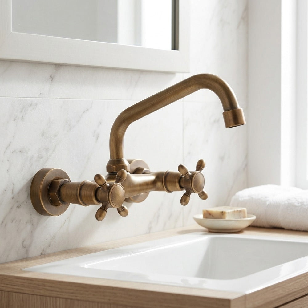 Lagomel wall-mount bathroom faucet in antique brass, set in a Traditional/Classic/Vintage/Retro bathroom