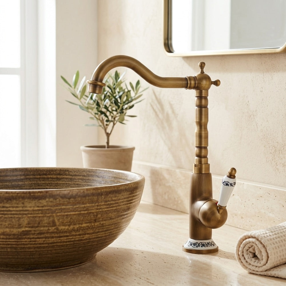 Lagomel single-hole single-handle vessel sink faucet in antique brass, set in a Traditional/Classic/Vintage/Retro bathroom