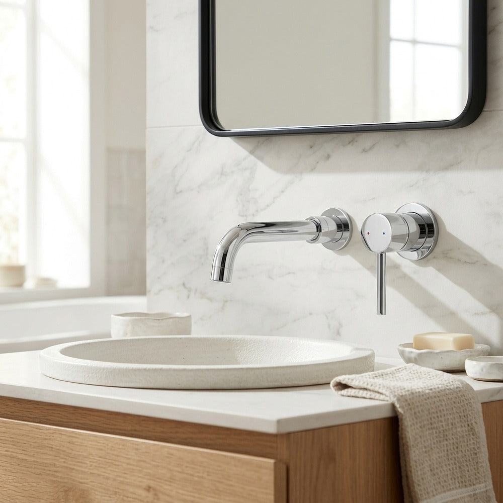 Lagomel single-handle wall-mount bathroom faucet in chrome, matte black, brushed gold, set in a Contemporary bathroom