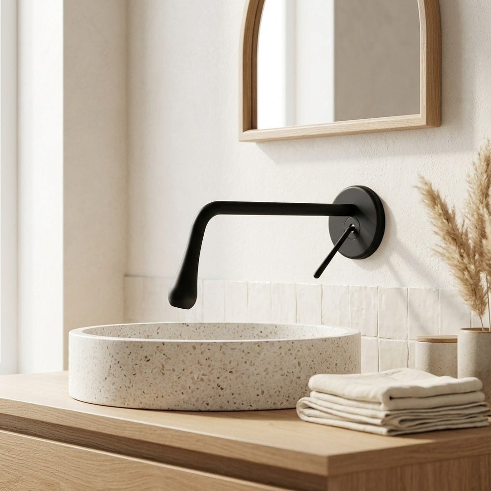 Lagomel single-handle wall-mount bathroom faucet, set in a Modern/Contemporary bathroom